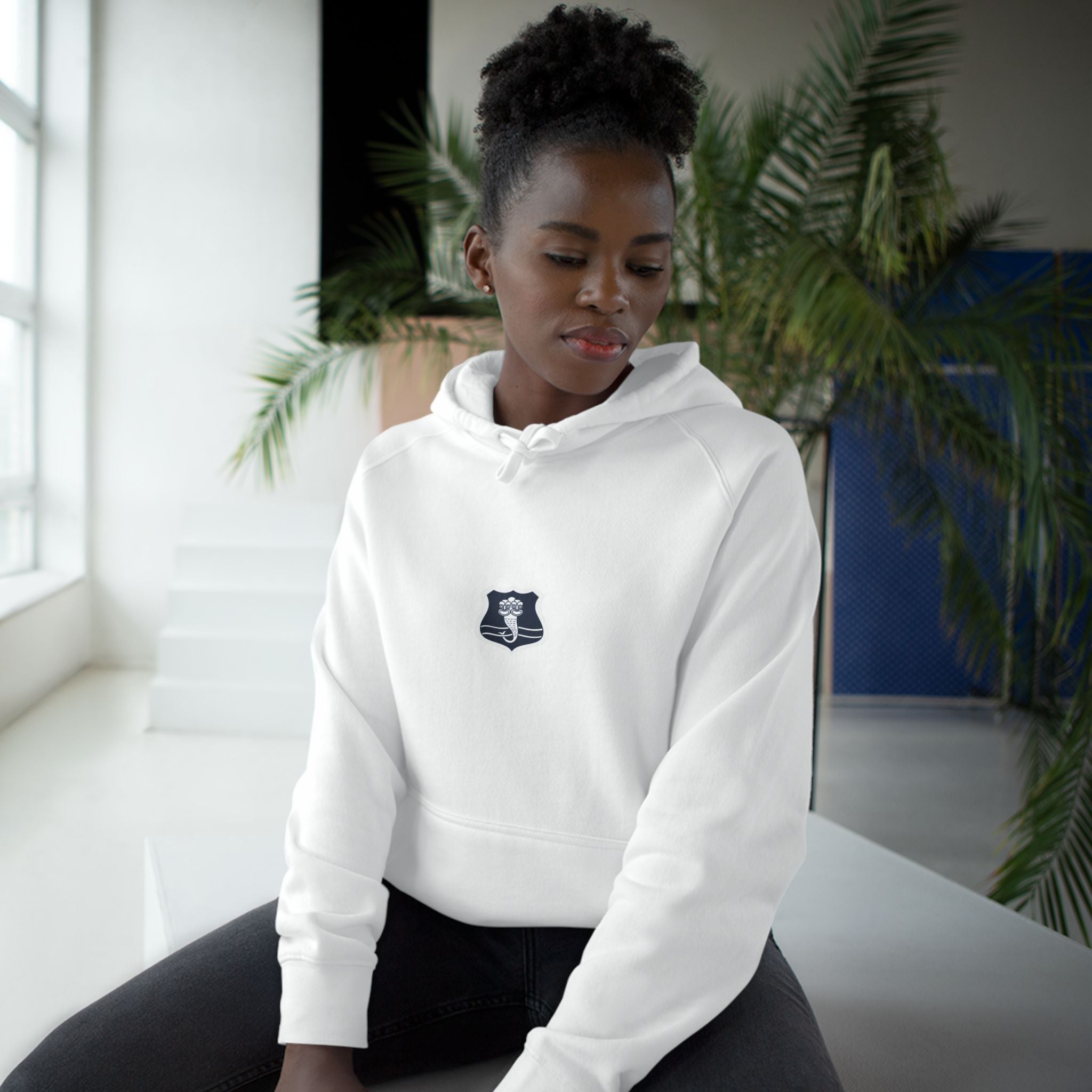 Minimalist Shield Patch Hoodie — Small Chest Crest Logo